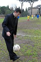 priest with soccer ball